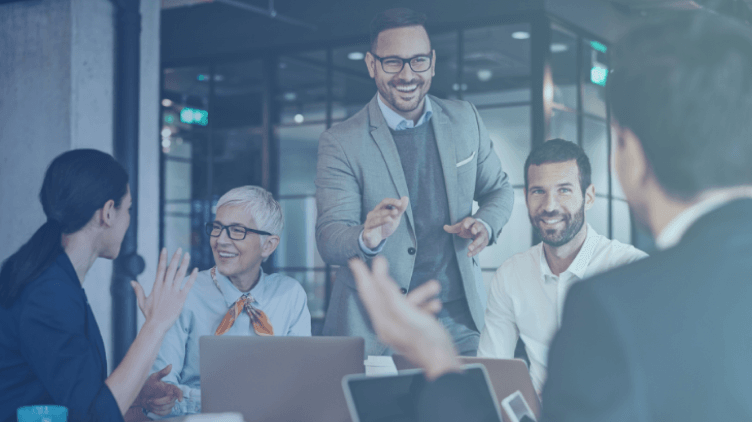 5 people discussing at work